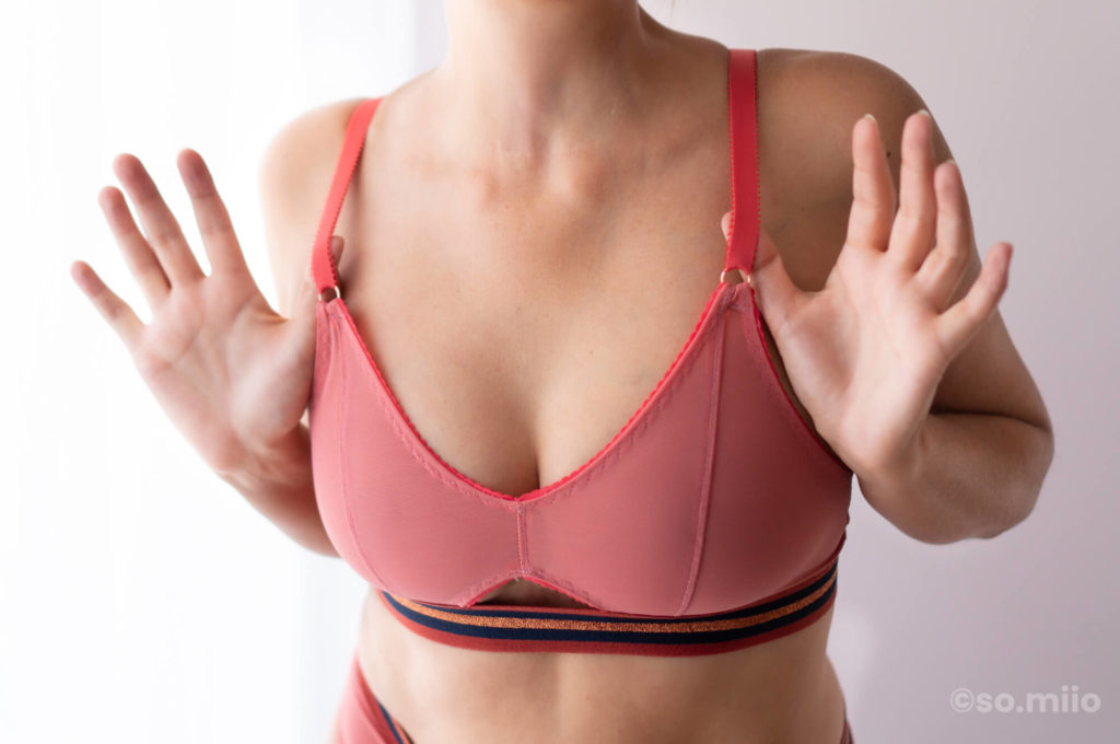 Barrett Bralette in a corail pink powernet from the front
